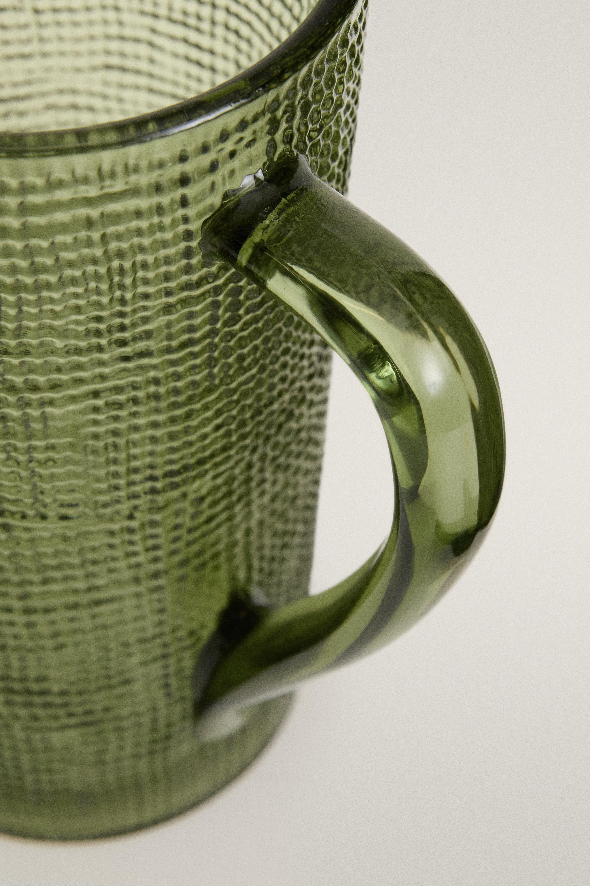 RAISED DESIGN GLASS PITCHER